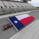 Illustration for article titled Chevy Tows Gigantic Texas Flag With Truck, Also Sets World Record With Other Flagem/emem/em